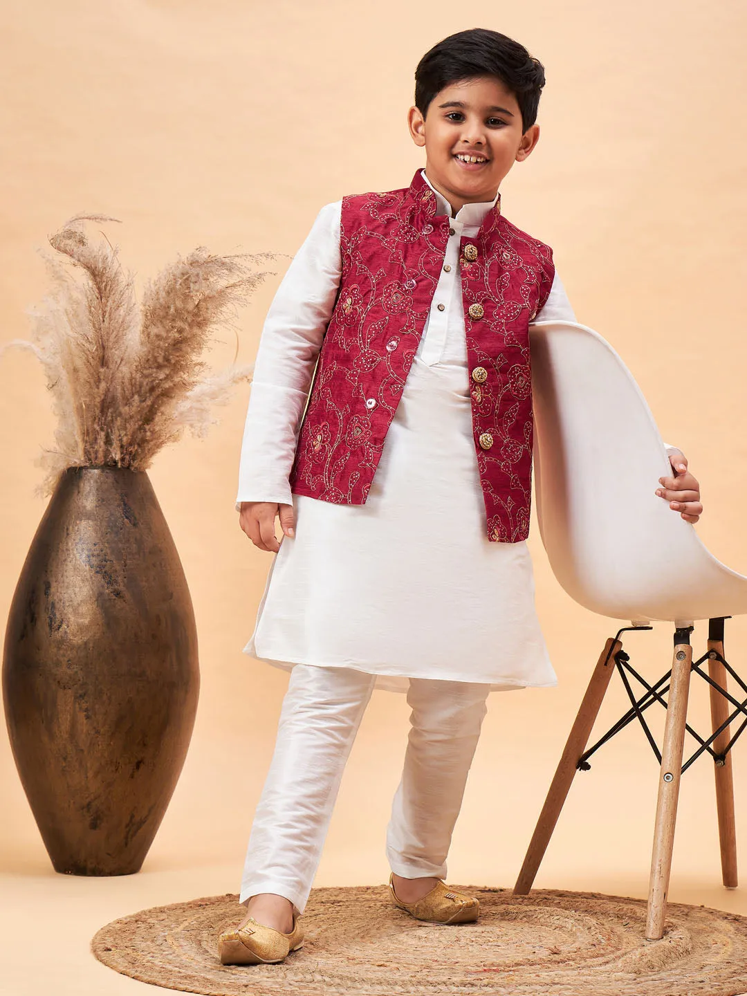 VASTRAMAY Boy's Maroon Nehru Jacket With White Kurta And Pyjama Set